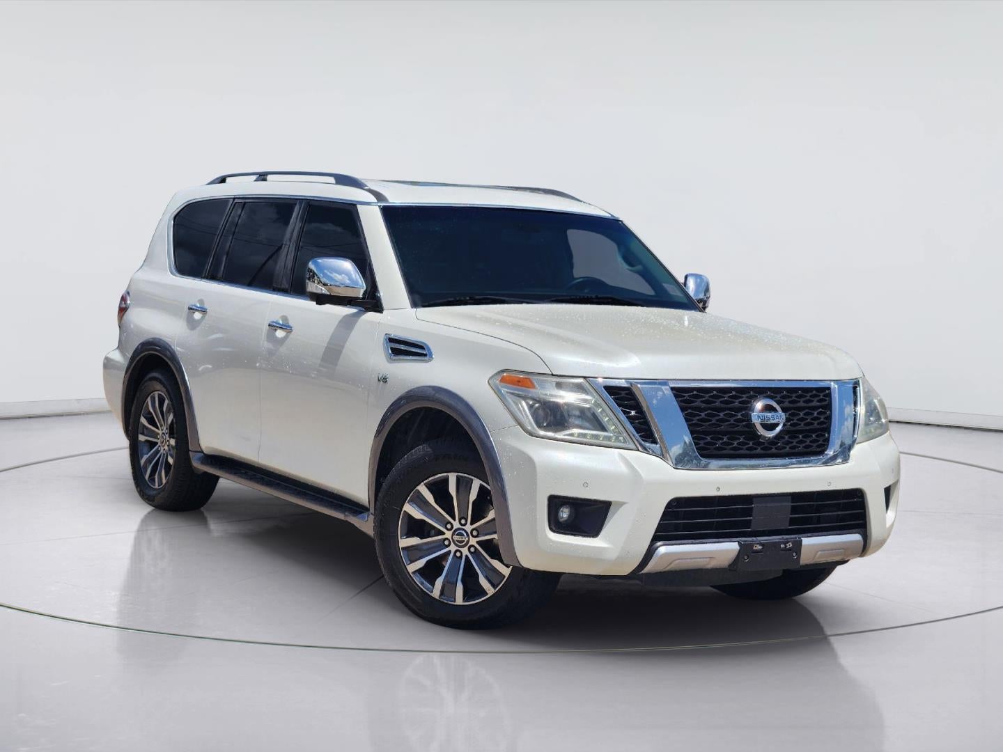 2017 Nissan Armada SL in Pearl White — front three-quarter view