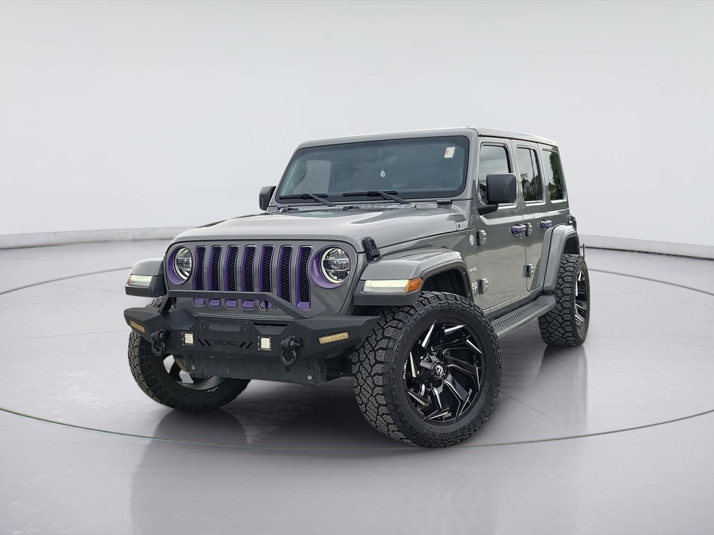 2022 Jeep Wrangler Unlimited Sahara in Sting-Gray Clearcoat — front three-quarter view