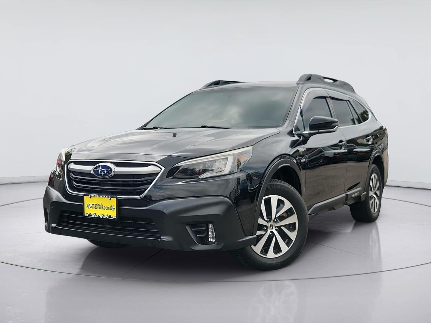 2020 Subaru Outback Premium in Crystal Black Silica — front three-quarter view