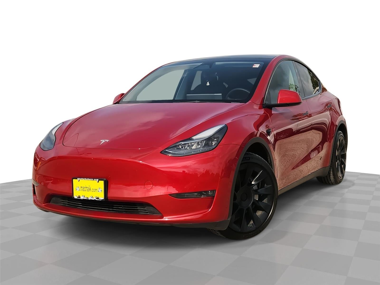 2023 Tesla MODELY LONG RANGE in Red — front three-quarter view