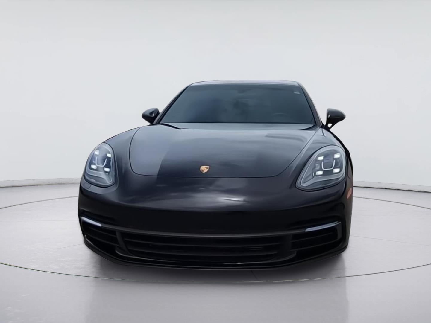 2018 Porsche Panamera — rear three-quarter view