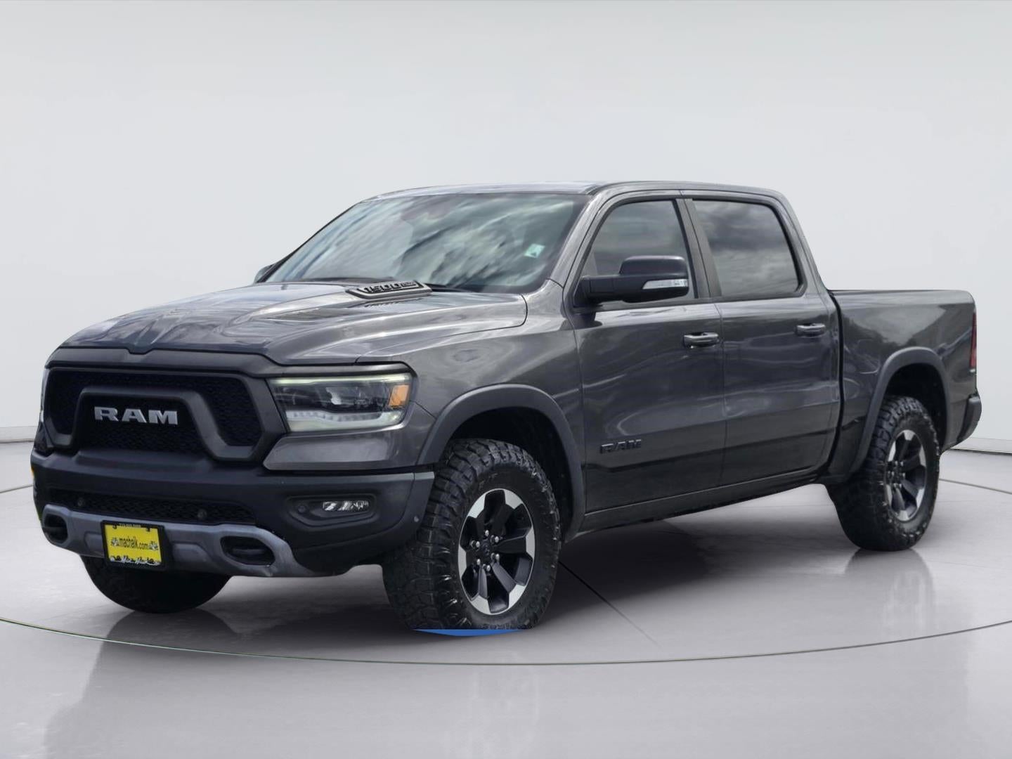2021 RAM 1500 Rebel in Granite Crystal Metallic Clearcoat — front three-quarter view