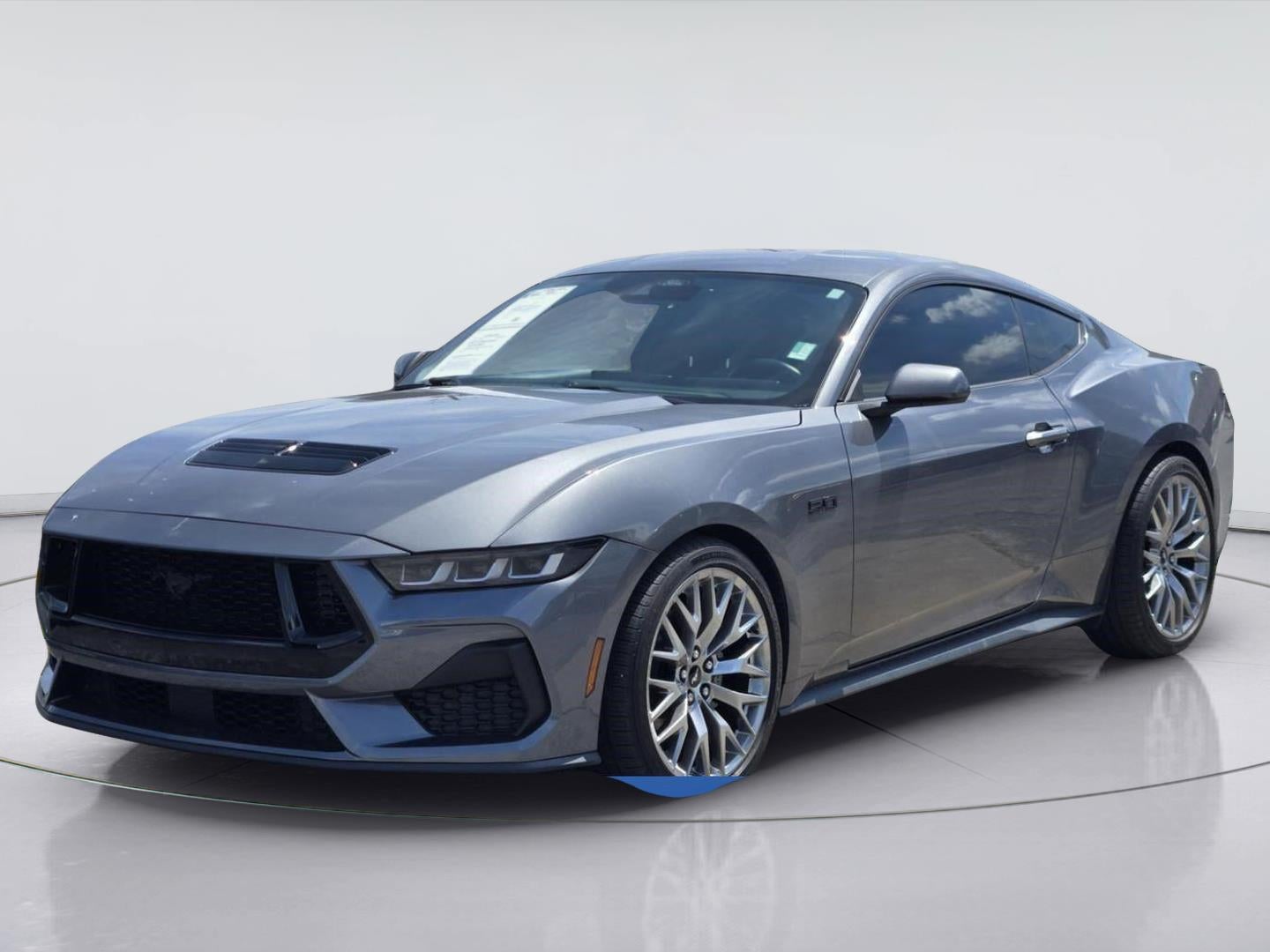 2024 Ford Mustang GT in Carbonized Gray — front three-quarter view