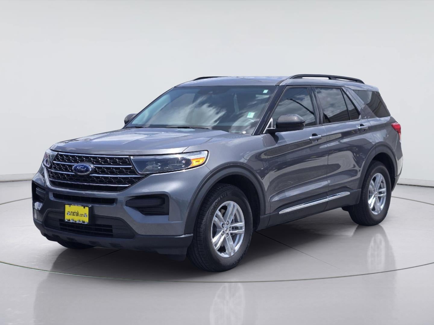 2024 Ford Explorer XLT in Carbonized Gray — front three-quarter view