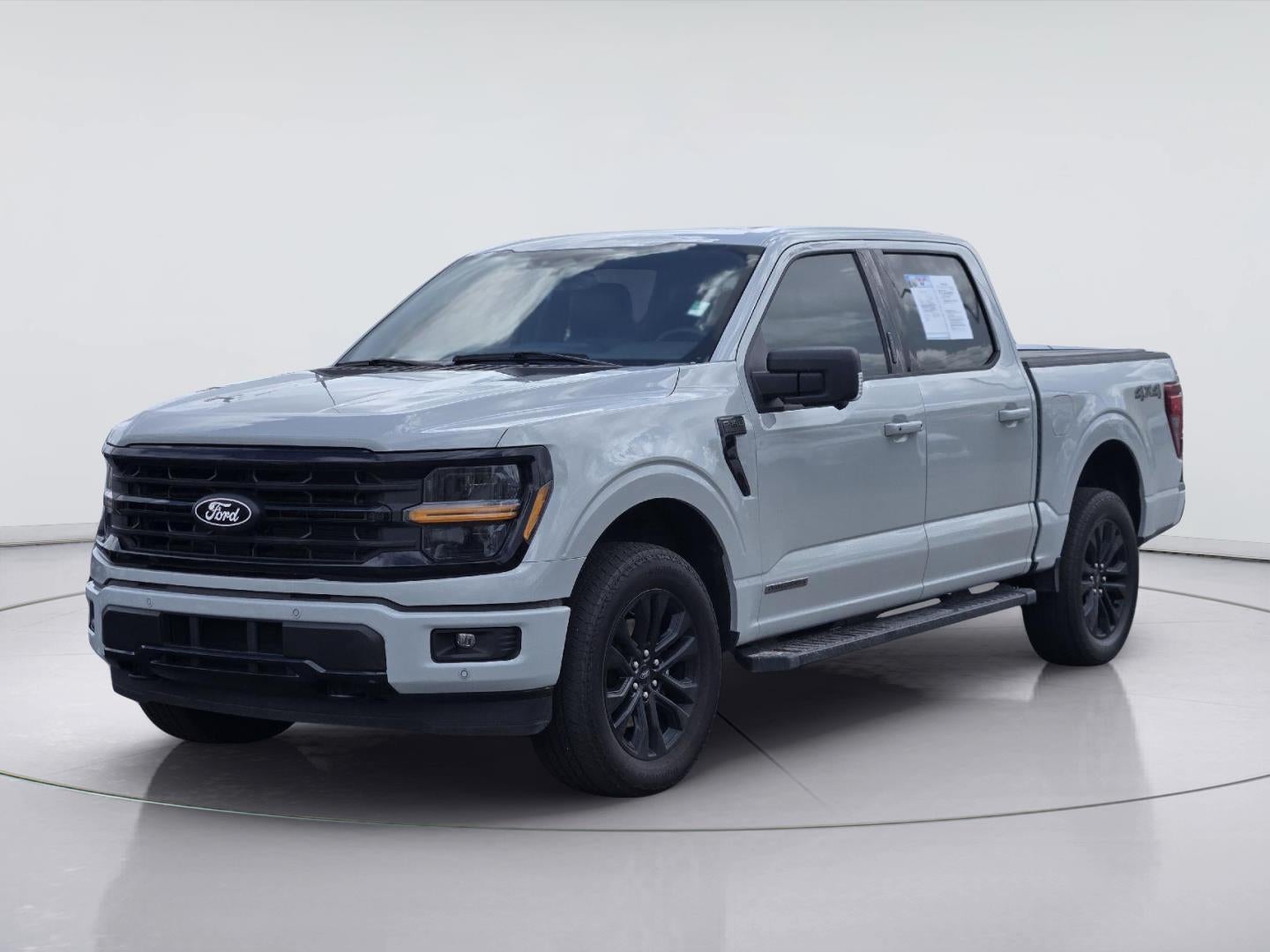 2024 Ford F-150 XLT in Avalanche Gray — front three-quarter view