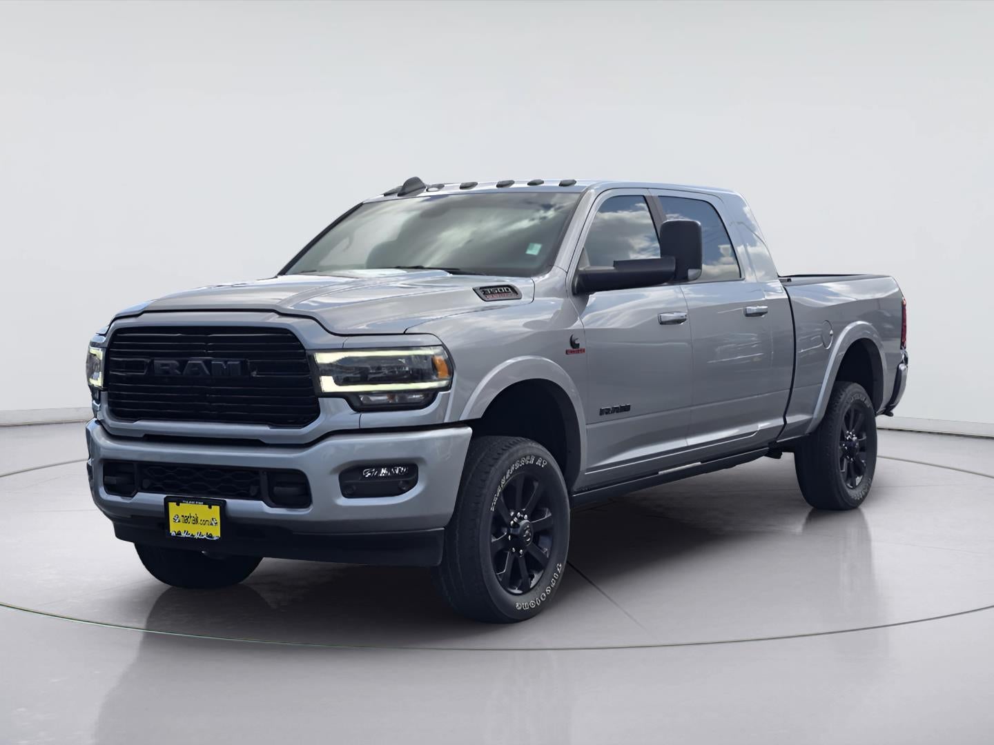 2022 RAM 3500 Laramie in Billet Silver Metallic Clearcoat — front three-quarter view
