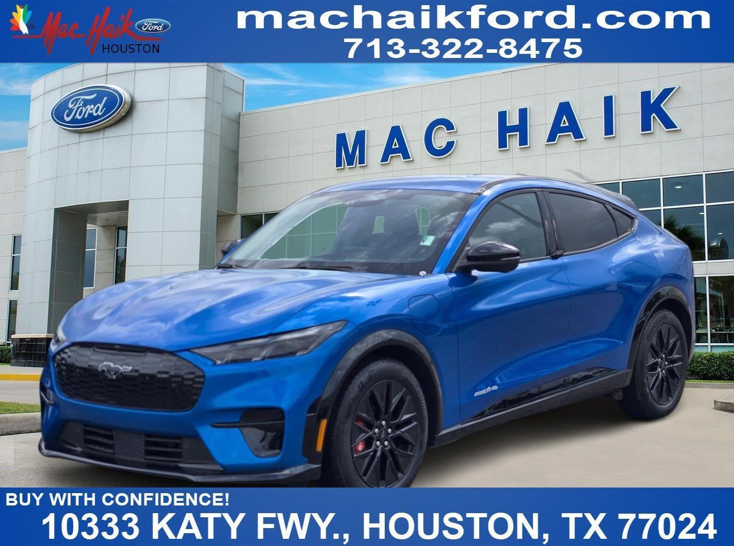 2025 Ford MUSTANG MACH-E PREMIUM in Velocity Blue — front three-quarter view
