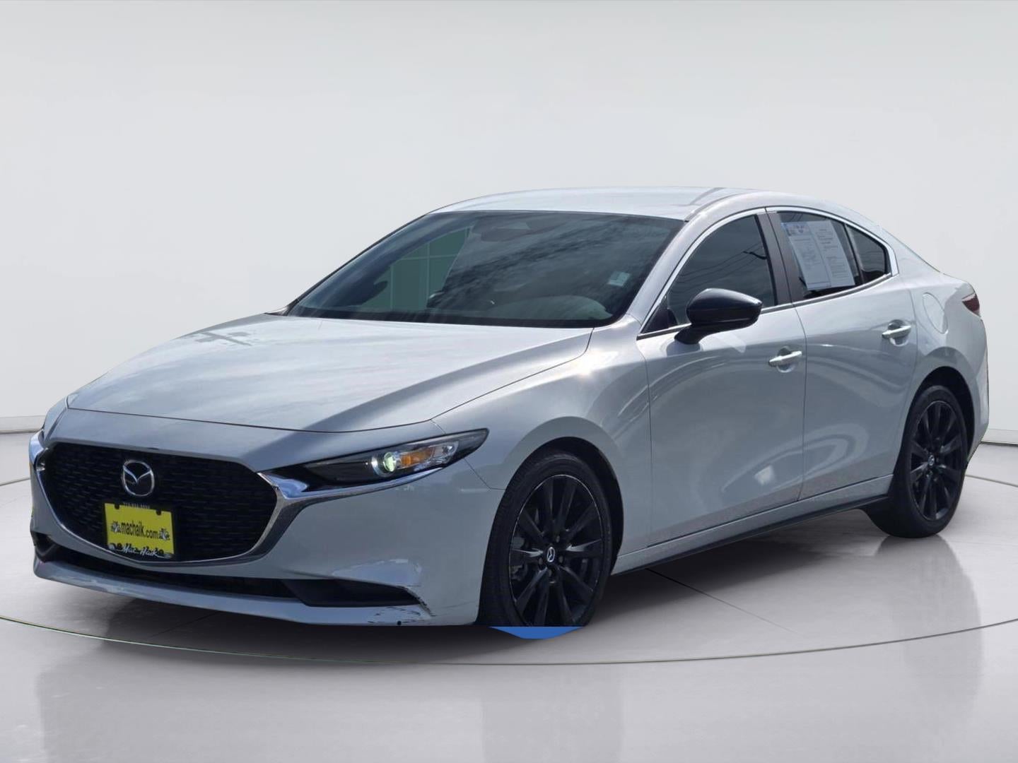 2025 Mazda Mazda3 Sedan 2.5 S Select Sport in Ceramic Metallic — front three-quarter view