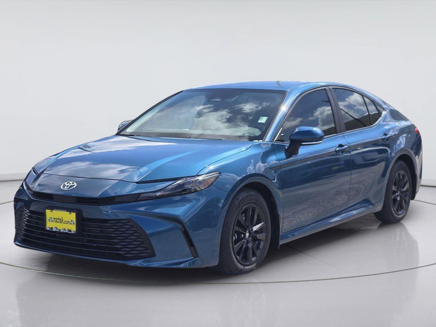 2025 Toyota Camry LE in Ocean Gem — front three-quarter view