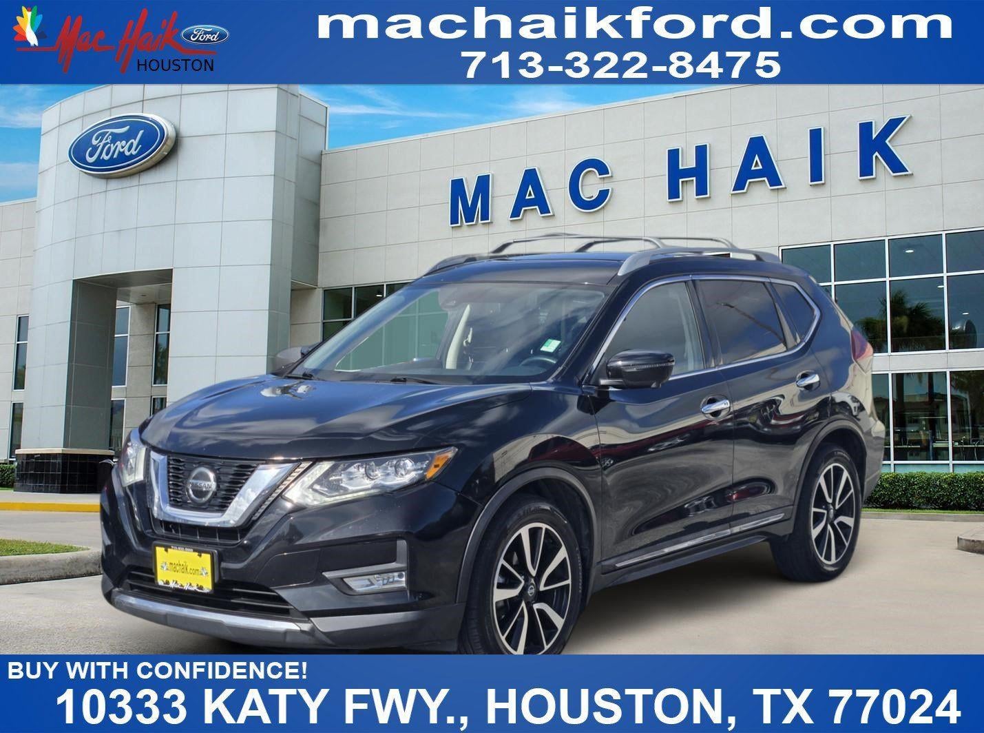 2019 Nissan Rogue SL in Magnetic Black Pearl — front three-quarter view