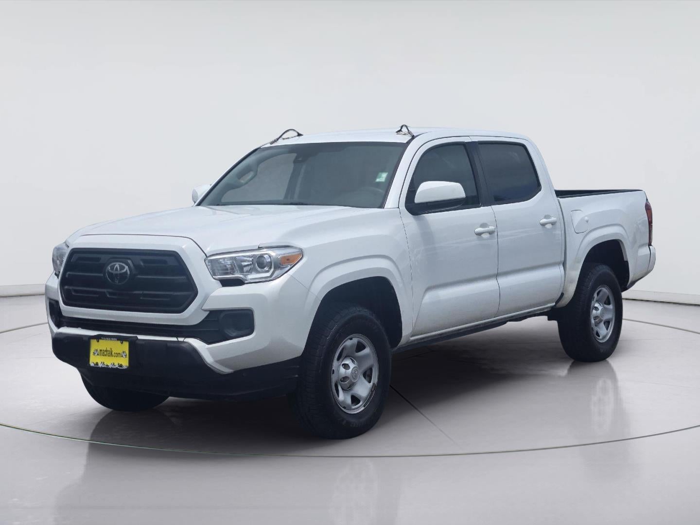 2018 Toyota Tacoma SR in Super White — front three-quarter view
