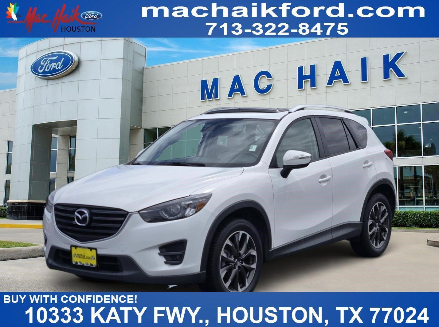 2016 Mazda Mazda 5 GRNDTR in White — front three-quarter view