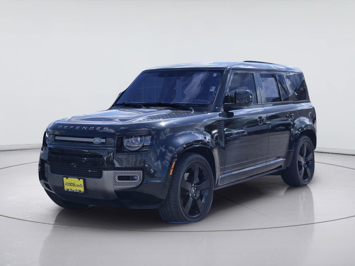 2022 Land Rover Defender X-Dynamic HSE in Santorini Black Metallic — front three-quarter view