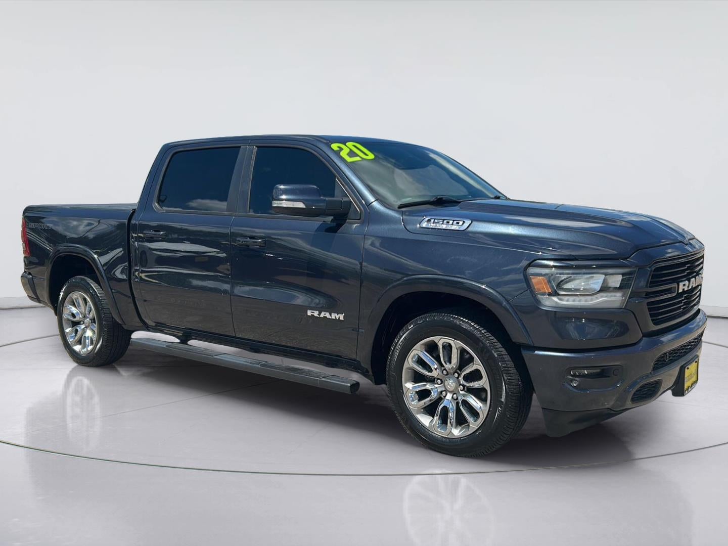 2020 RAM 1500 Laramie in Diamond Black Crystal Pearlcoat — front three-quarter view