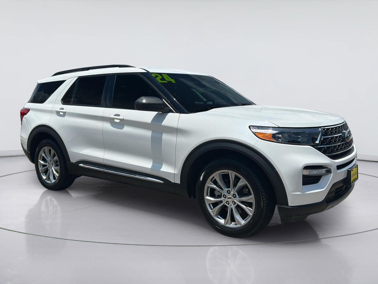2024 Ford Explorer XLT in Star White Metallic Tri-Coat — front three-quarter view