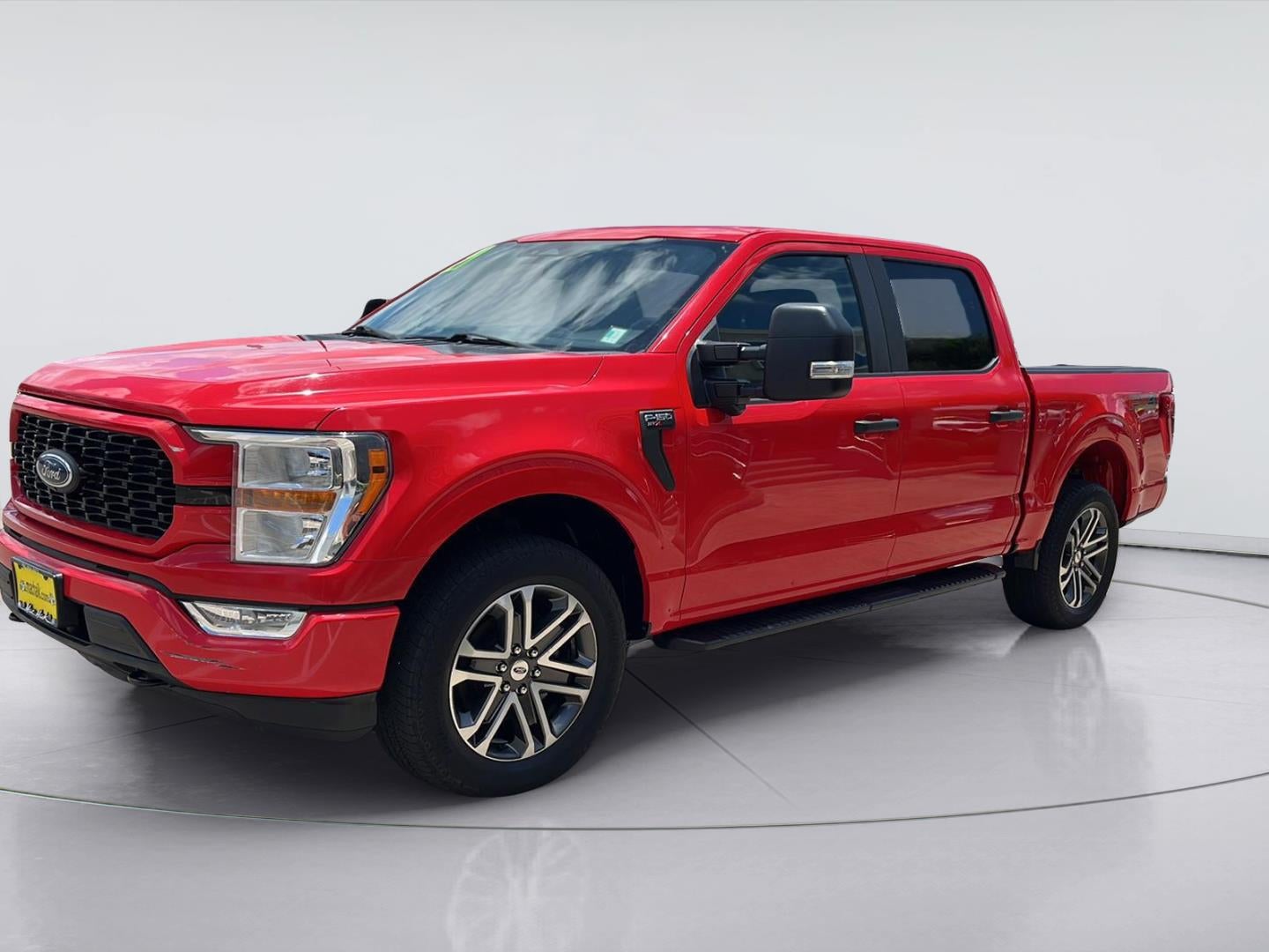 2021 Ford F-150 XL in Race Red — front three-quarter view