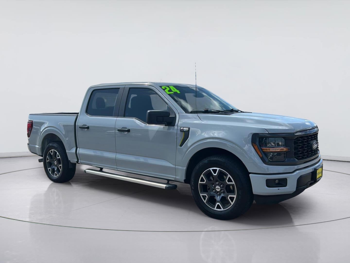 2024 Ford F-150 STX in Avalanche Gray — front three-quarter view