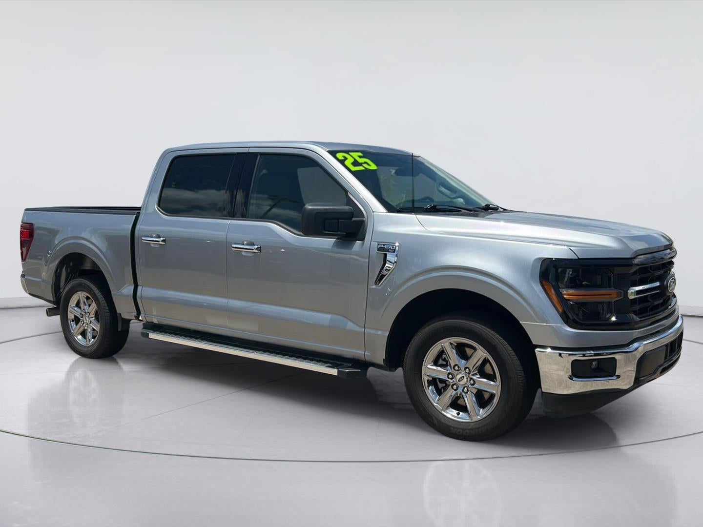2025 Ford F-150 XLT in Iconic Silver — front three-quarter view