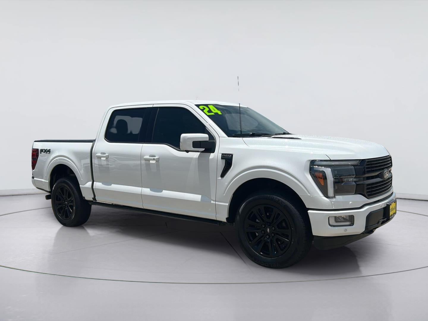 2024 Ford F-150 Platinum in Star White Metallic Tri-Coat — front three-quarter view