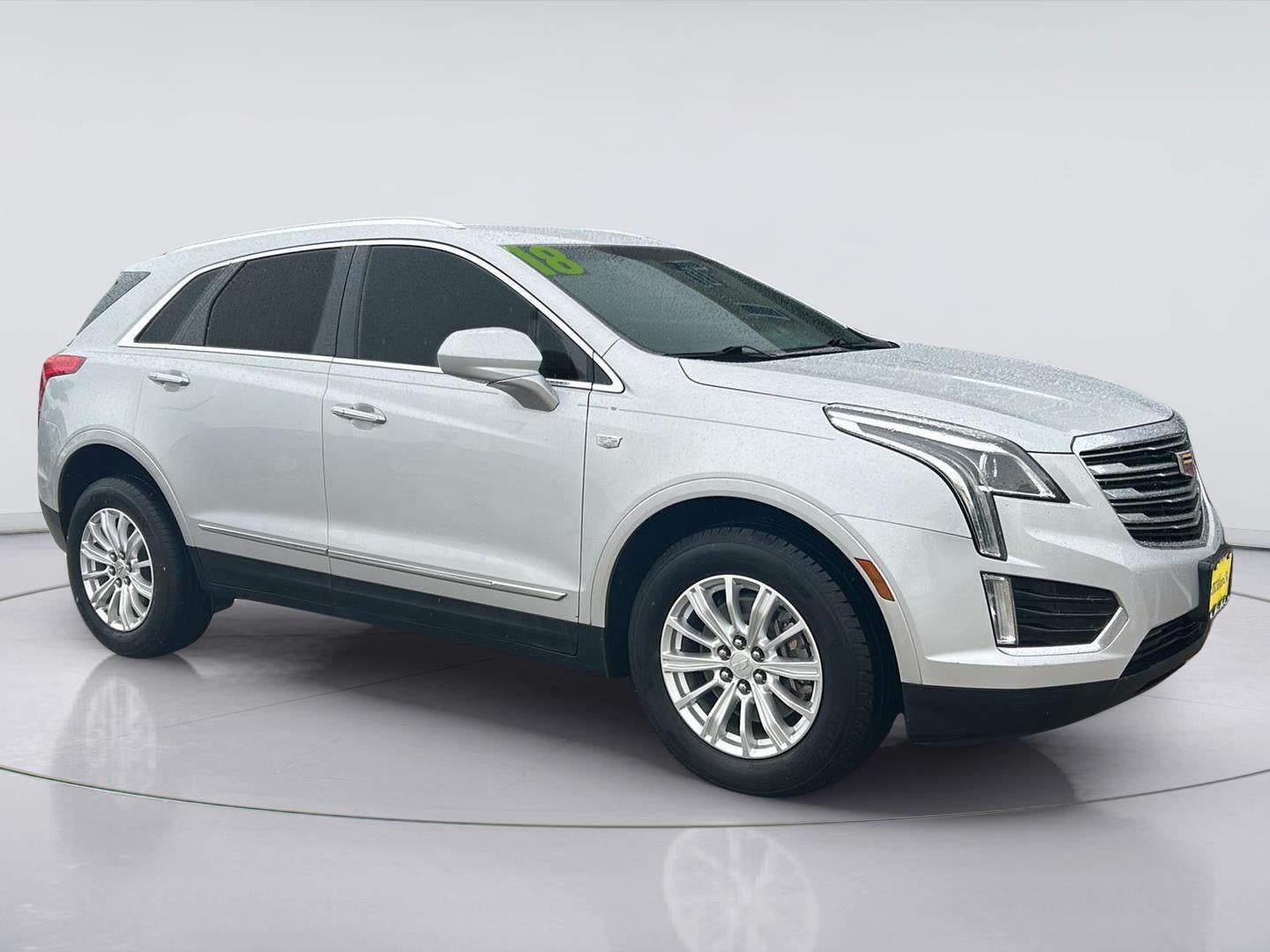 2018 Cadillac XT5 FWD in Radiant Silver Metallic — front three-quarter view