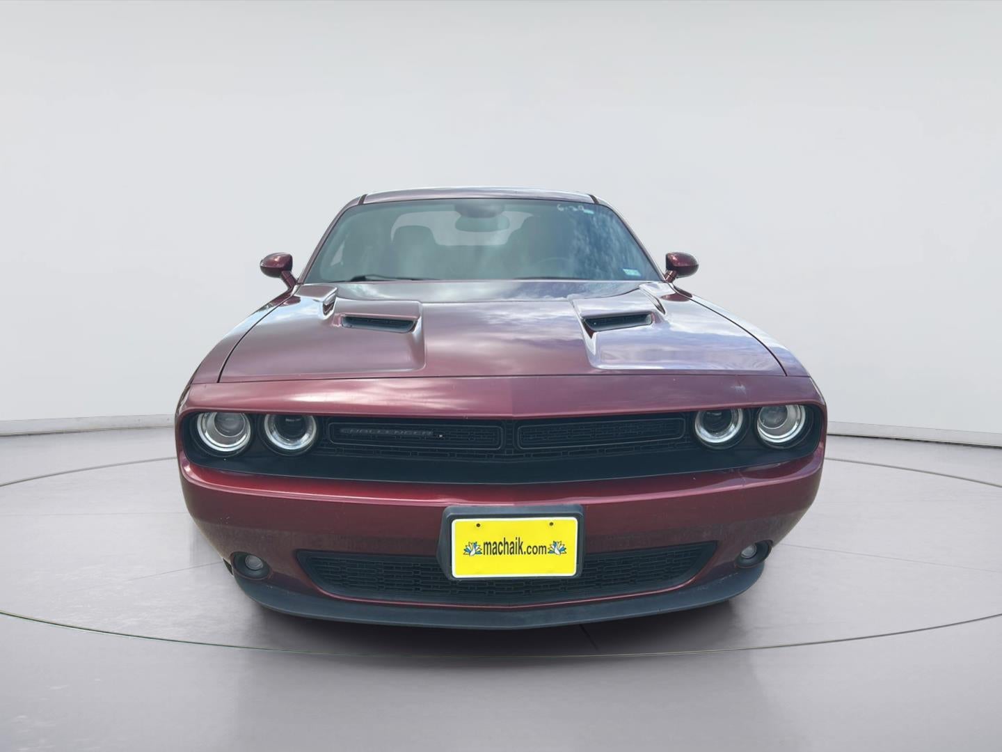2018 Dodge Challenger SXT Plus in Octane Red Pearlcoat — front three-quarter view