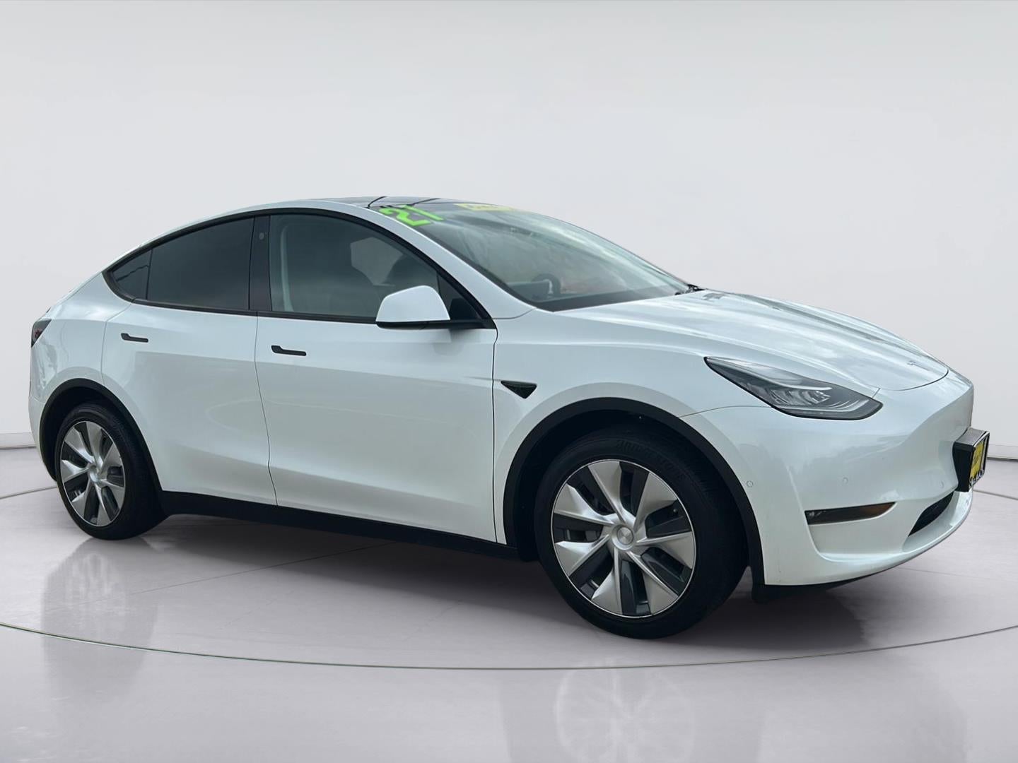 2021 Tesla Model Y Long Range in Pearl White Multi-Coat — front three-quarter view