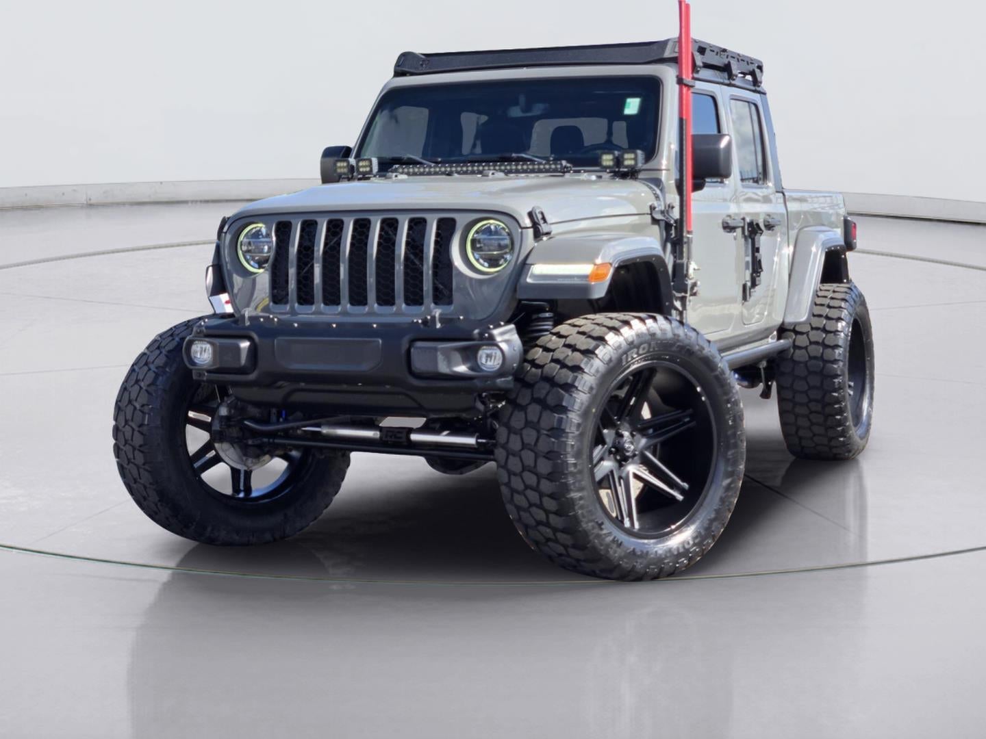 2021 Jeep Gladiator Freedom in Black Clearcoat — front three-quarter view