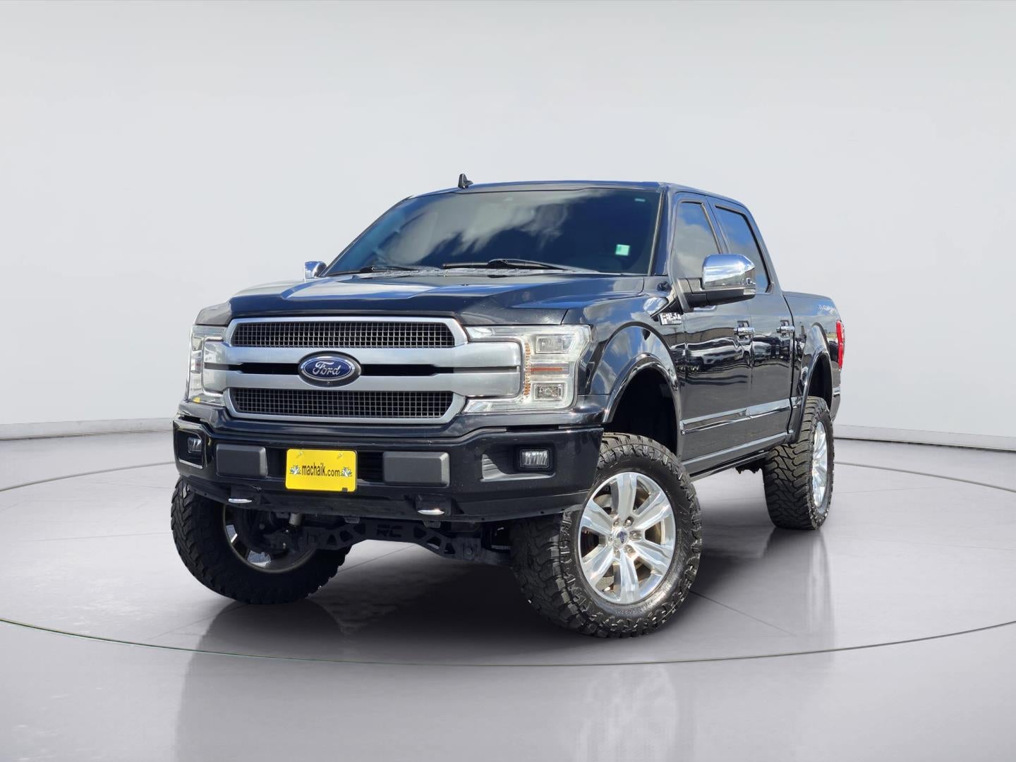 2018 Ford F-150 Platinum in Shadow Black — front three-quarter view