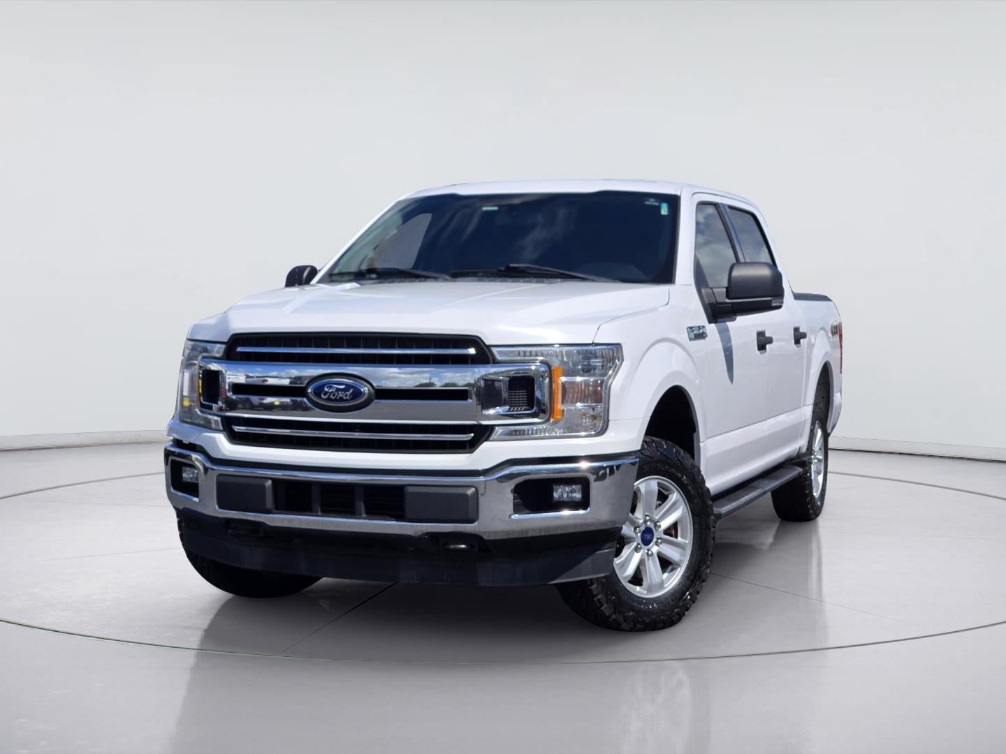 2019 Ford F-150 XLT in Oxford White — front three-quarter view