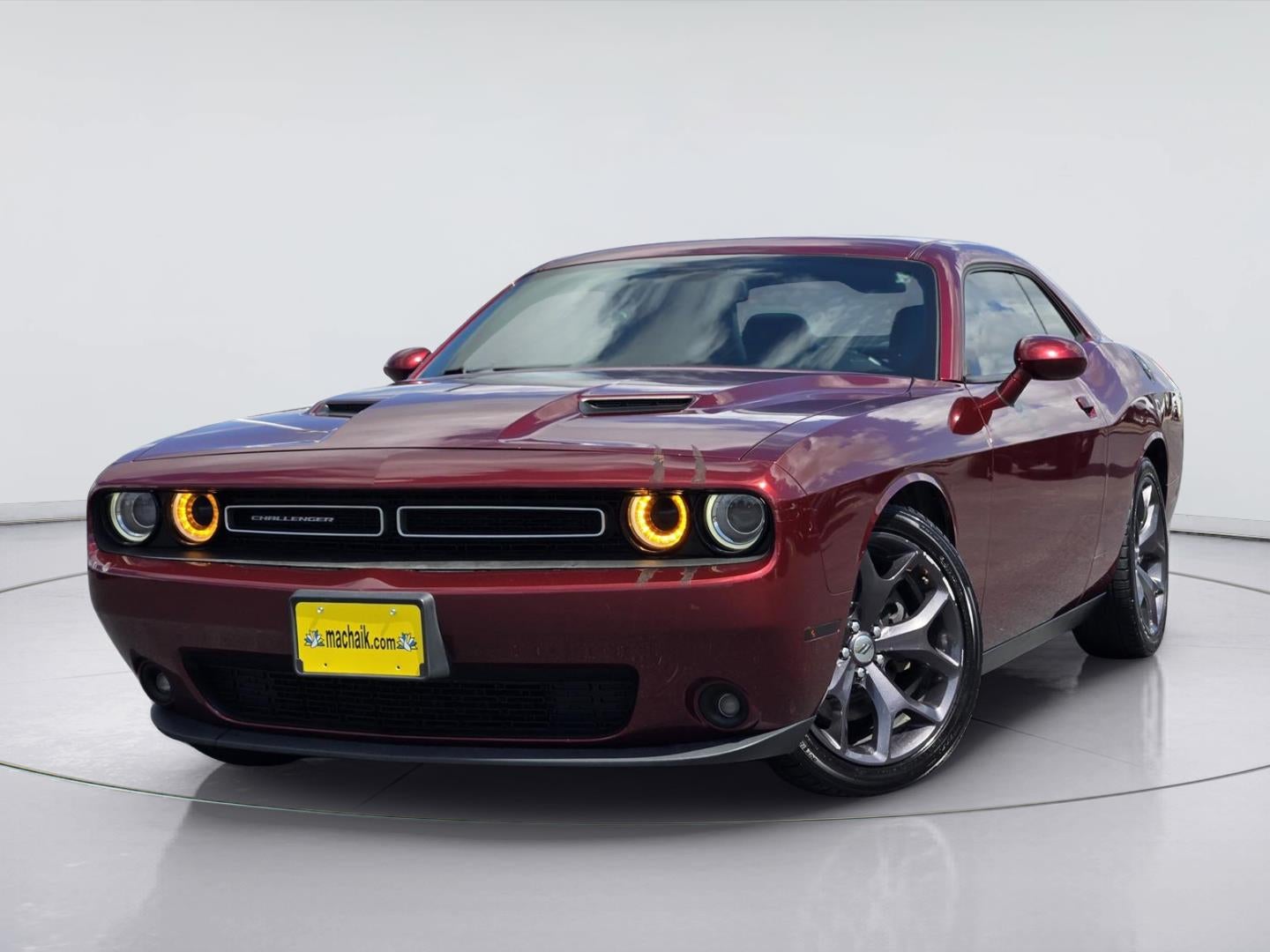 2018 Dodge Challenger SXT Plus in Octane Red Pearlcoat — front three-quarter view