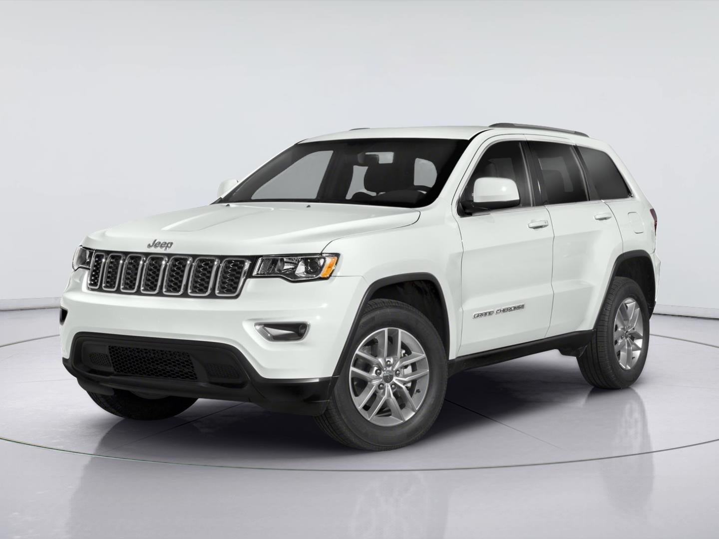 2020 Jeep Grand Cherokee Laredo E in Bright White Clearcoat — front three-quarter view