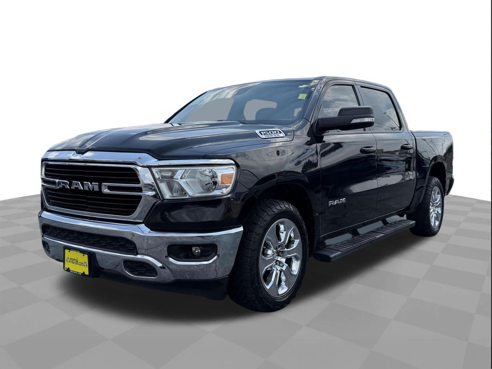 2021 RAM 1500 Lone Star in Diamond Black Crystal Pearlcoat — front three-quarter view