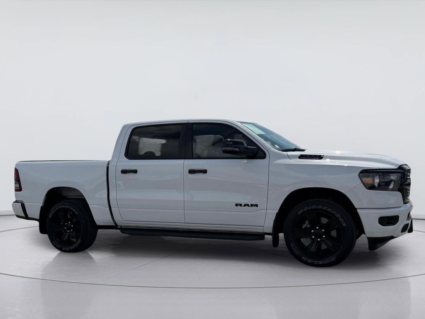 2024 RAM 1500 Lone Star in Bright White Clearcoat — front three-quarter view