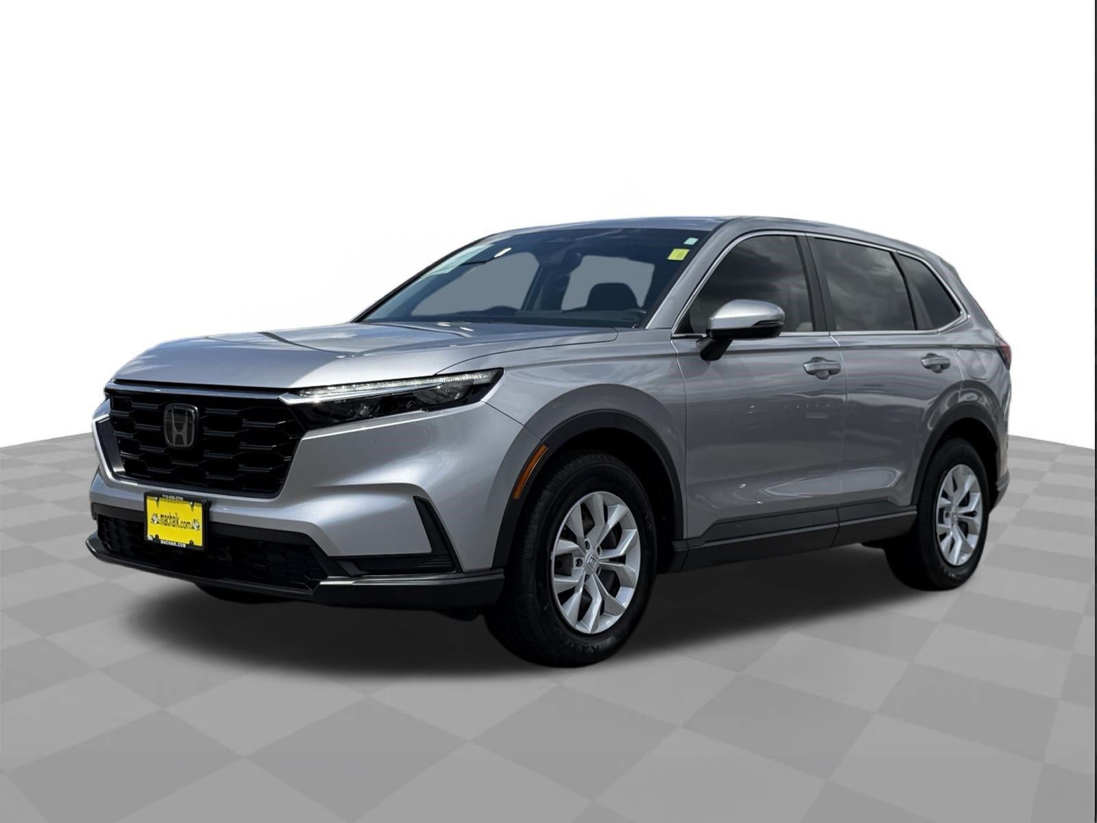 2024 Honda CR-V LX in Lunar Silver Metallic — front three-quarter view