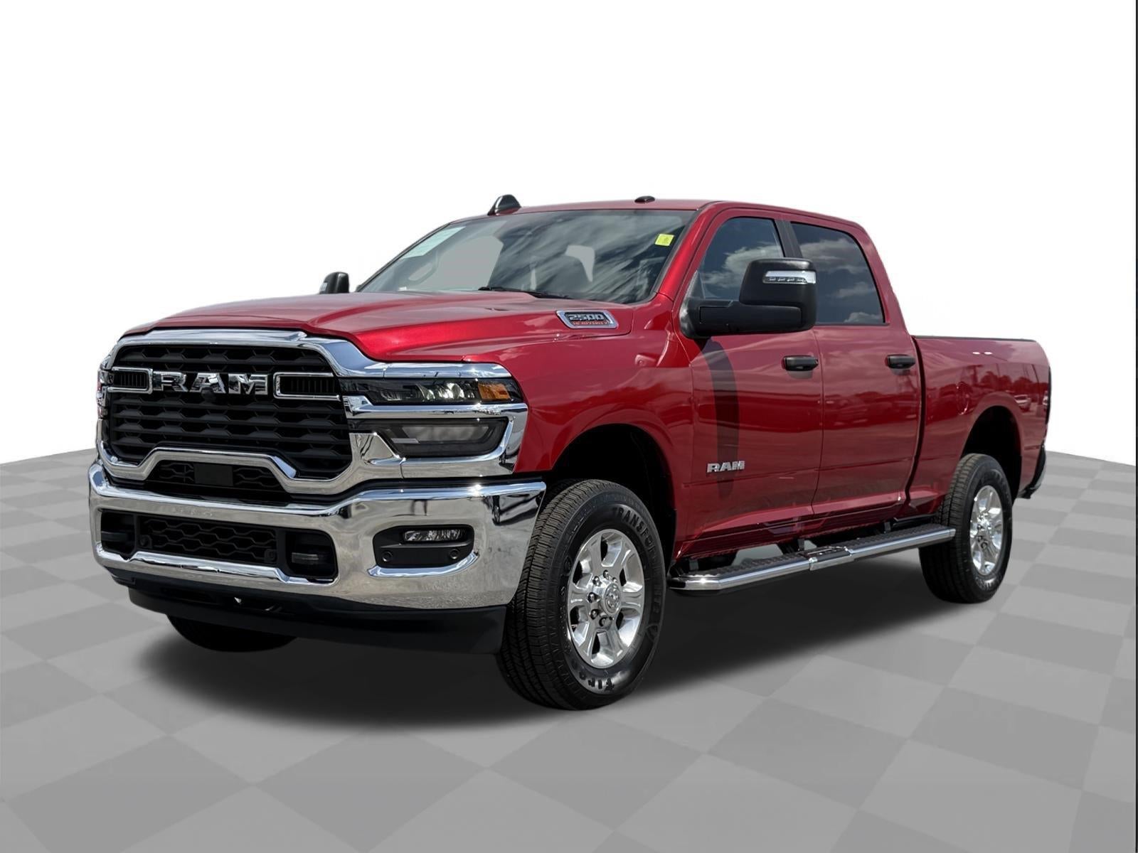2026 RAM 2500 Big Horn in Molten Red Pearlcoat — front three-quarter view