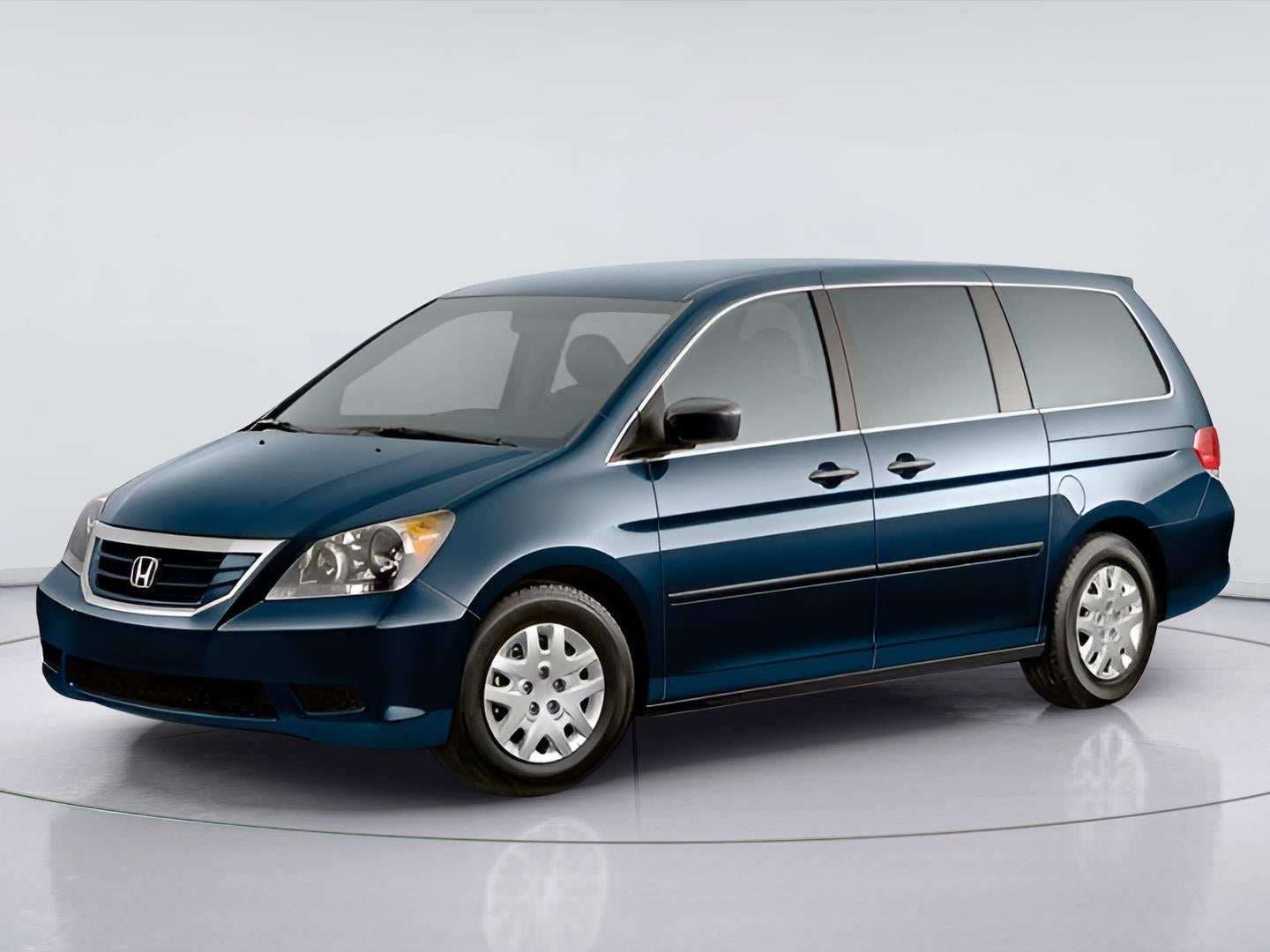 2009 Honda ODYSSEY LX in White — front three-quarter view
